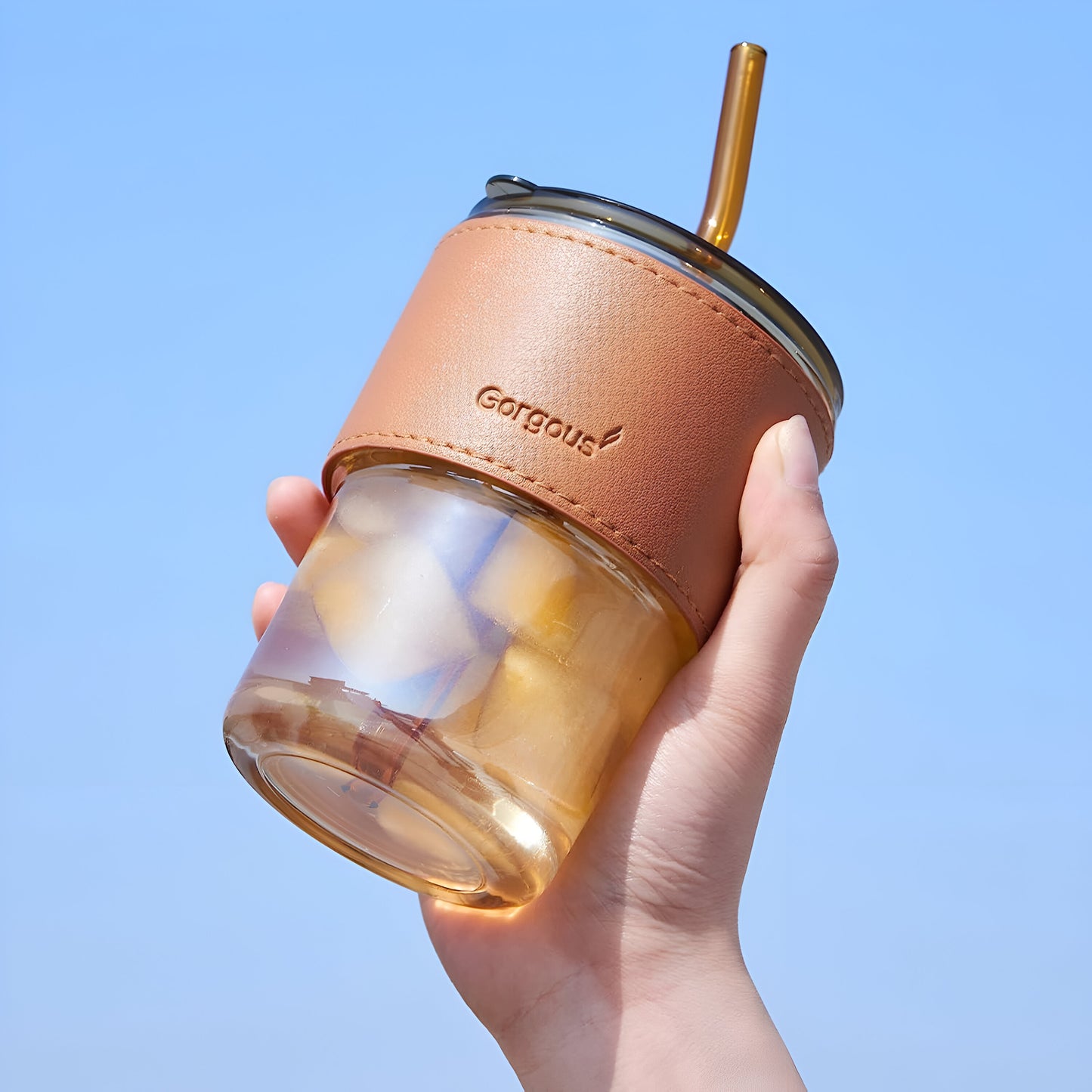 Over glass water bottle with straw