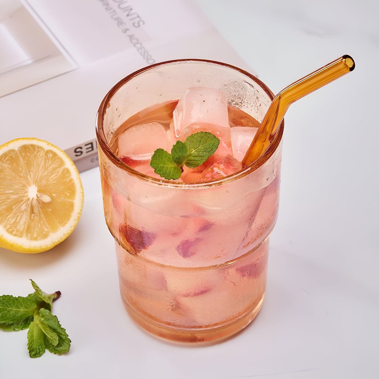 Over glass water bottle with straw